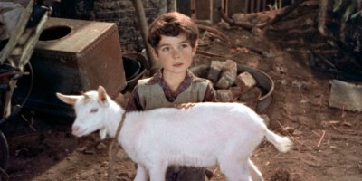 Joe holding the 'unicorn' in A Kid for Two Farthings.