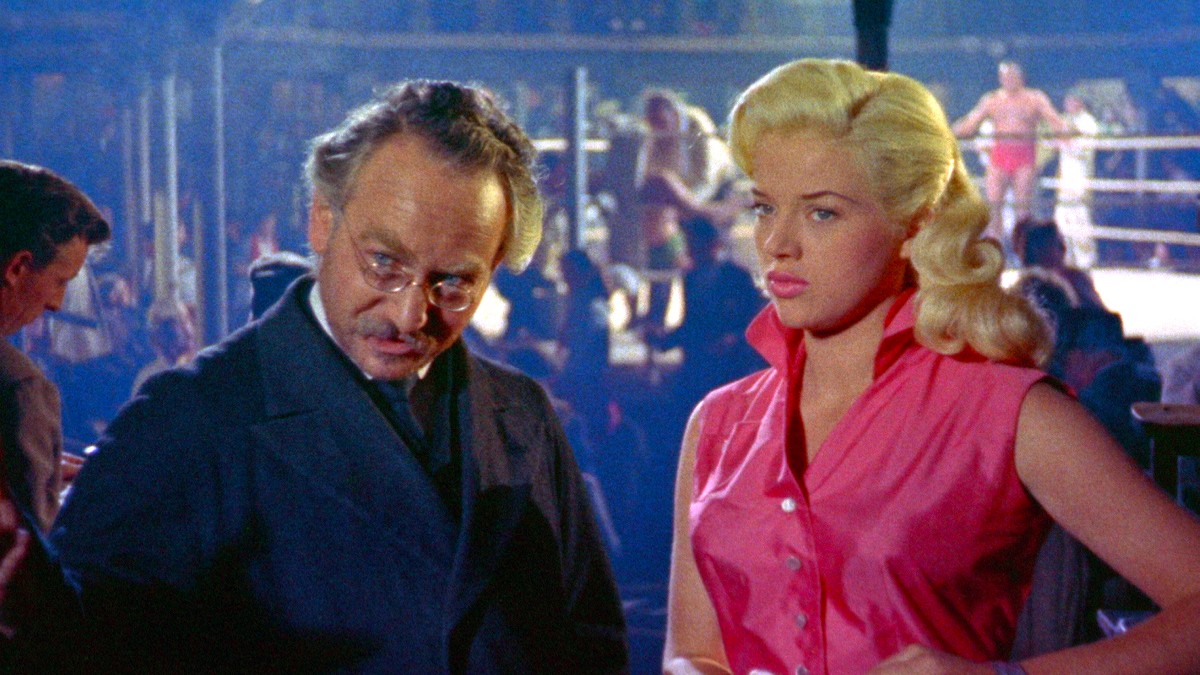 Mr. Kandinsky and Sonia at the boxing match in A Kid for Two Farthings.