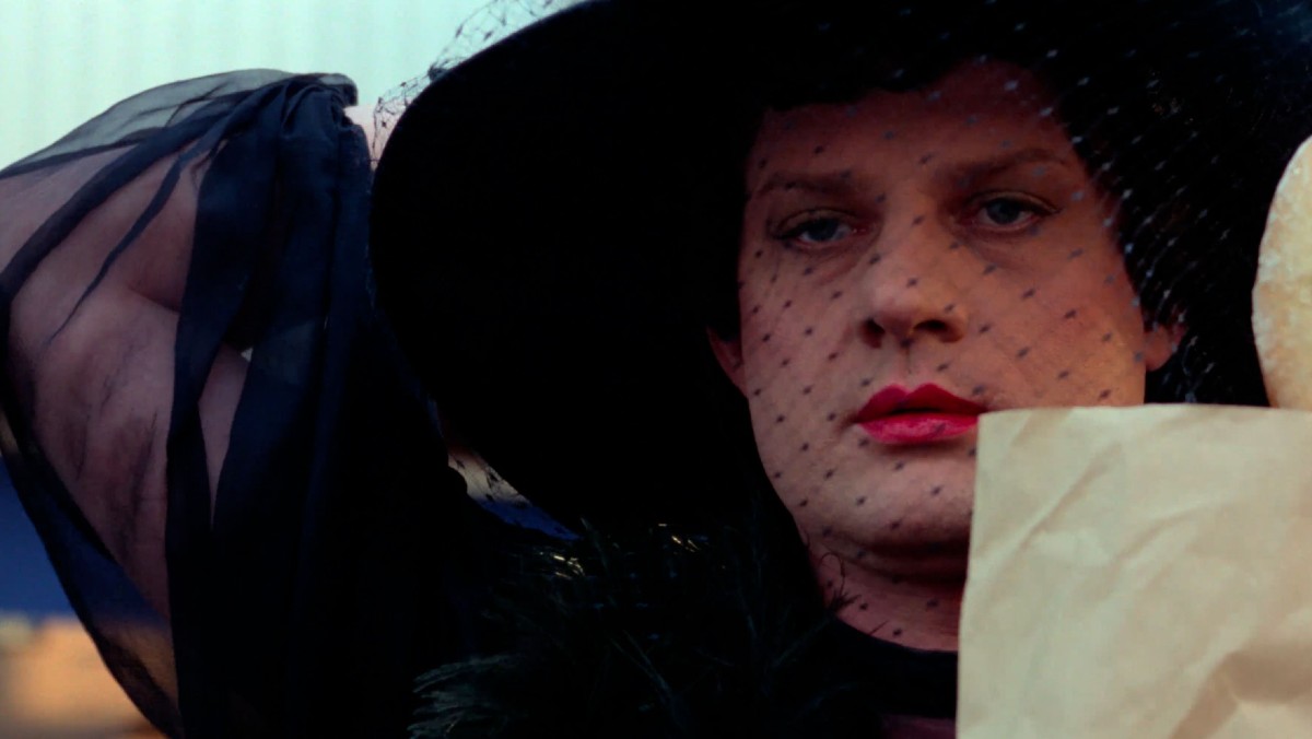 Elvira wearing a black dress and veil in a shot from In a Year of 13 Moons.