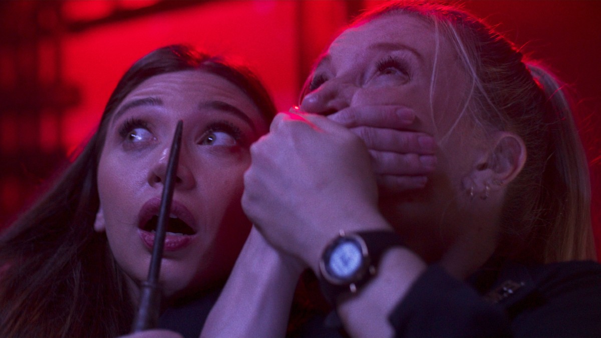 Selena and another survivor in Screamboat.