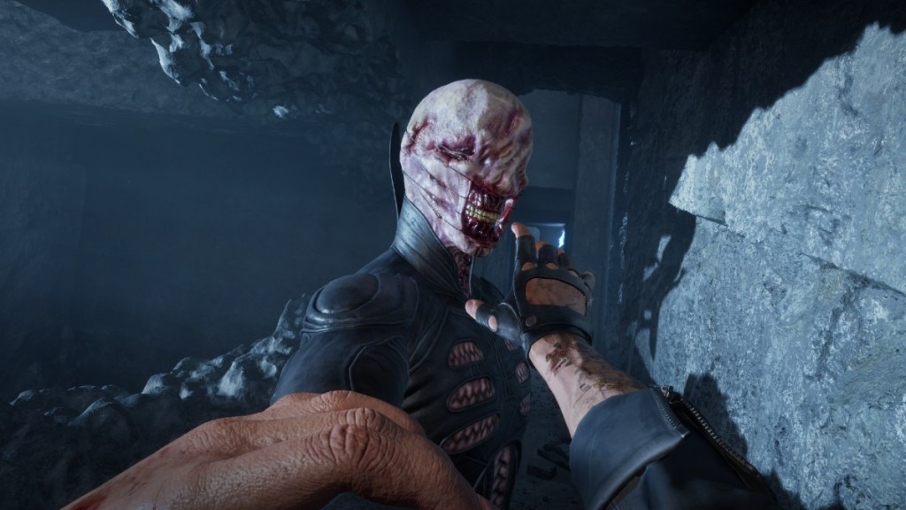 Aidan grappling with the Chatterer in Clive Barker's Hellraiser: Revival.